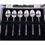 A cased set of six silver teaspoons, T A H, Sheffield 1934