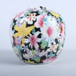 An early 20th century Chinese porcelain painted ginger jar, decorated with flowers, six character