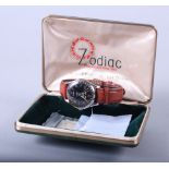 A gentleman's 1970s Zodiac automatic wristwatch, on leather strap, with box and papers, two