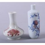 A Chinese porcelain bottle shaped vase, decorated peaches on underglaze blue and red, six