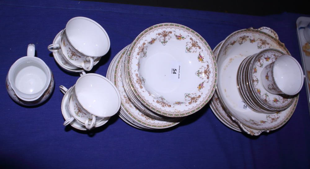 An Aynsley part tea service decorated with sprays of flowers