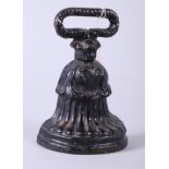 A painted cast iron door stop by A K & Sons, 7" high