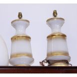 A pair of milk glass and gilt decorated table lamps, 15" high