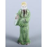 A 19th century Chinese painted pottery figure of a standing bearded gentleman, 4" high