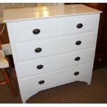 An Edwardian white painted chest of two short and three long drawers, 36" wide