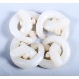 A 19th century? white jade brooch of four intertwining dragons, 1 3/4" wide