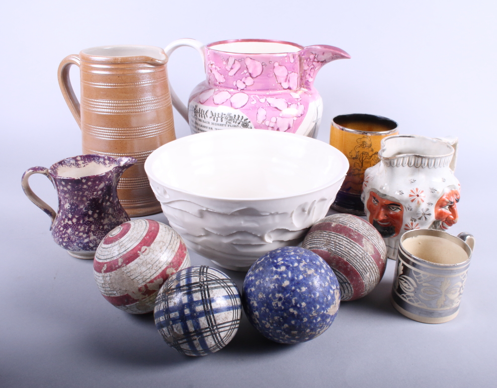 Various decorative ceramics, including an 1820s Staffordshire mask jug, a larger Sunderland lustre