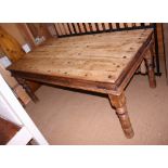 A Sheesham dining table, on turned supports, 74" x 36"