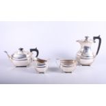 A silver matched four-piece teaset comprising teapot, coffee pot, milk jug and two-handled sugar