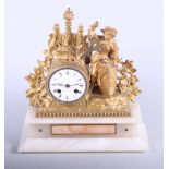 An early gilt metal clock, cast in the form of a young male sailor, on a hardstone plinth base, 11