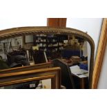 A late 19th century gilt framed arch top overmantel mirror, plate 49" x 38"