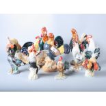 A collection of porcelain cockerel models, including Algora, Beswick, etc (some a/f)