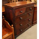 A Victorian mahogany chest of two short and three long graduated drawers with knob handles, on block