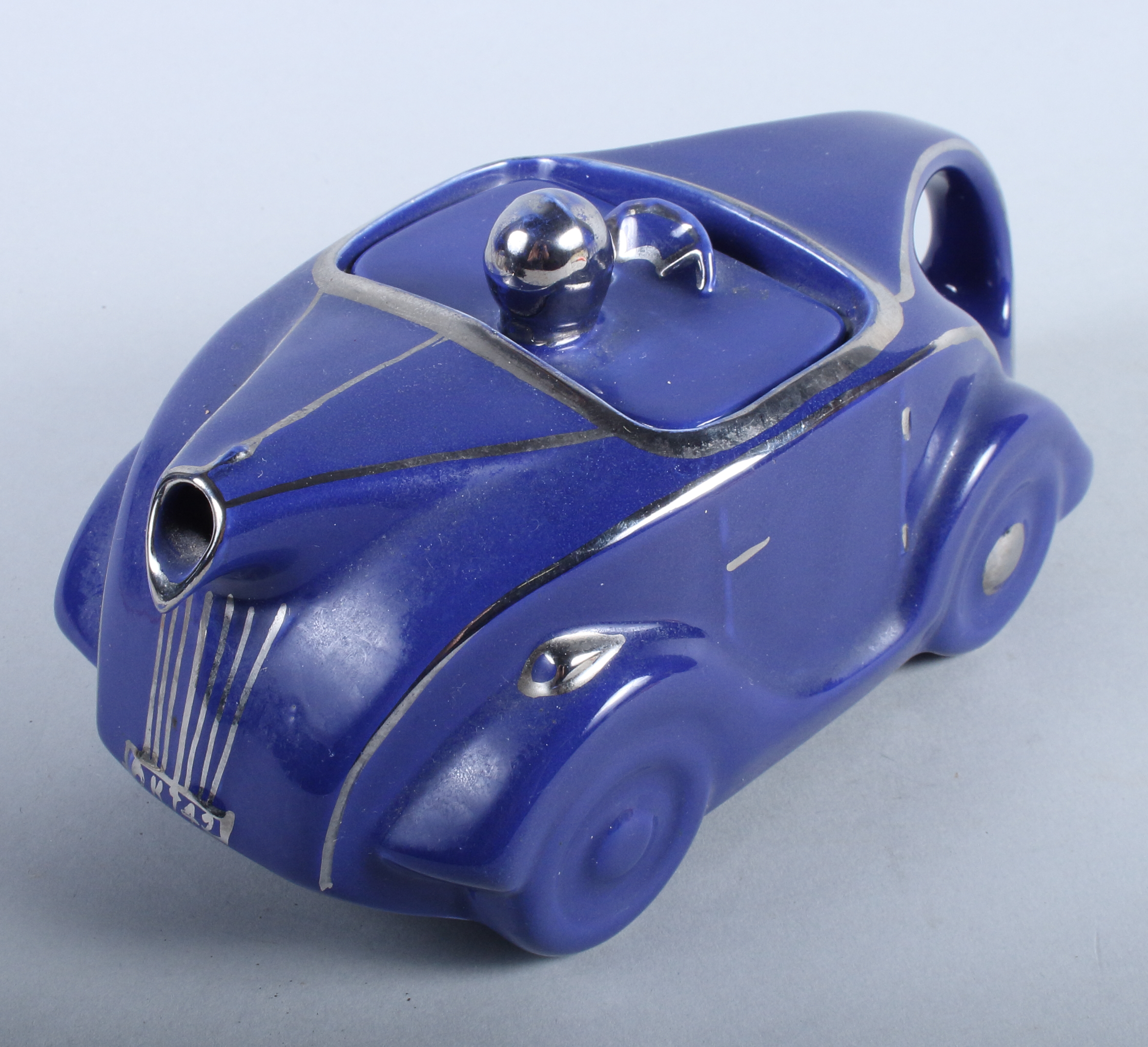 A 1930s Stabler design blue glazed racing car teapot, 9" long - Image 2 of 6