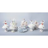 Eight early 20th century porcelain crinoline ladies
