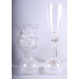 A pair of moulded glass mallet decanters, a silver plate and glass lantern and a cut glass vase