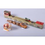 A mid 20th century German tin-plate clockwork articulated model of a crocodile, a model train and a