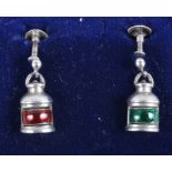 A pair of early 20th century silver and enamel earrings, in the form of port and starboard lamps