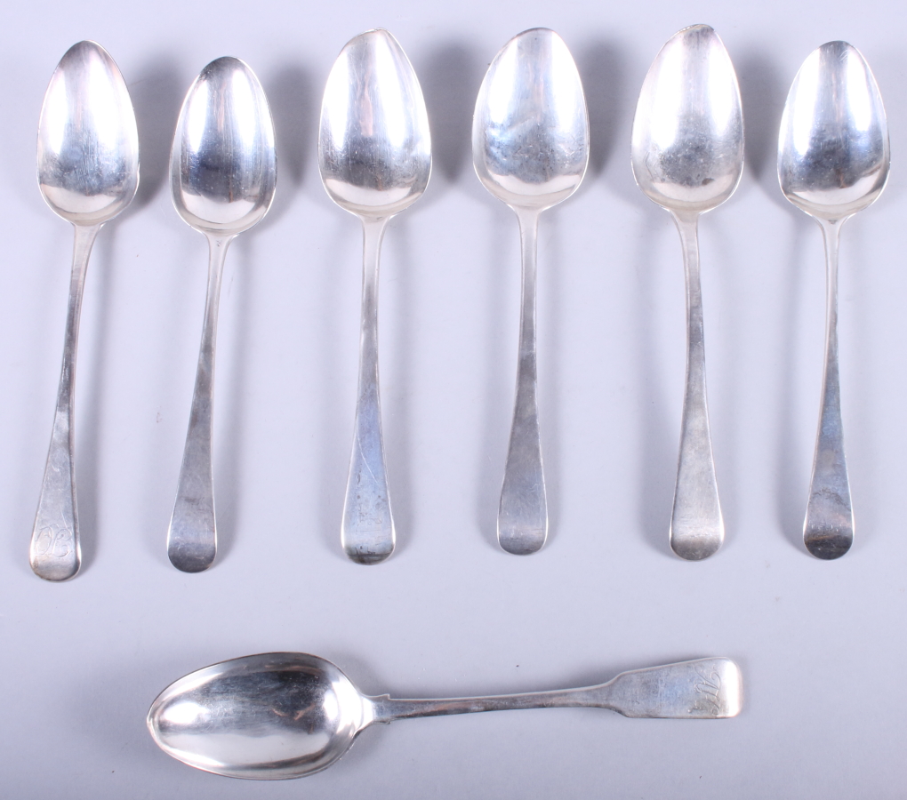 Six Georgian silver Old English pattern tablespoons and one other tablespoon, 13.5oz troy approx