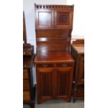 An Edwardian walnut and satinwood banded side cabinet, the upper section enclosed two doors over two