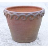 A stoneware planter with Vitruvian scroll decoration, 20" wide