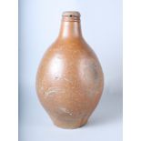 A 17th century Bellarmine design stoneware jug, 12" high