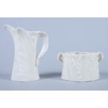 A Royal Worcester "leaf ware" porcelain milk jug and matching sugar bowl, 4" high
