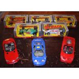 Five boxed Burago scale models of F1 racing cars and three similar sports cars