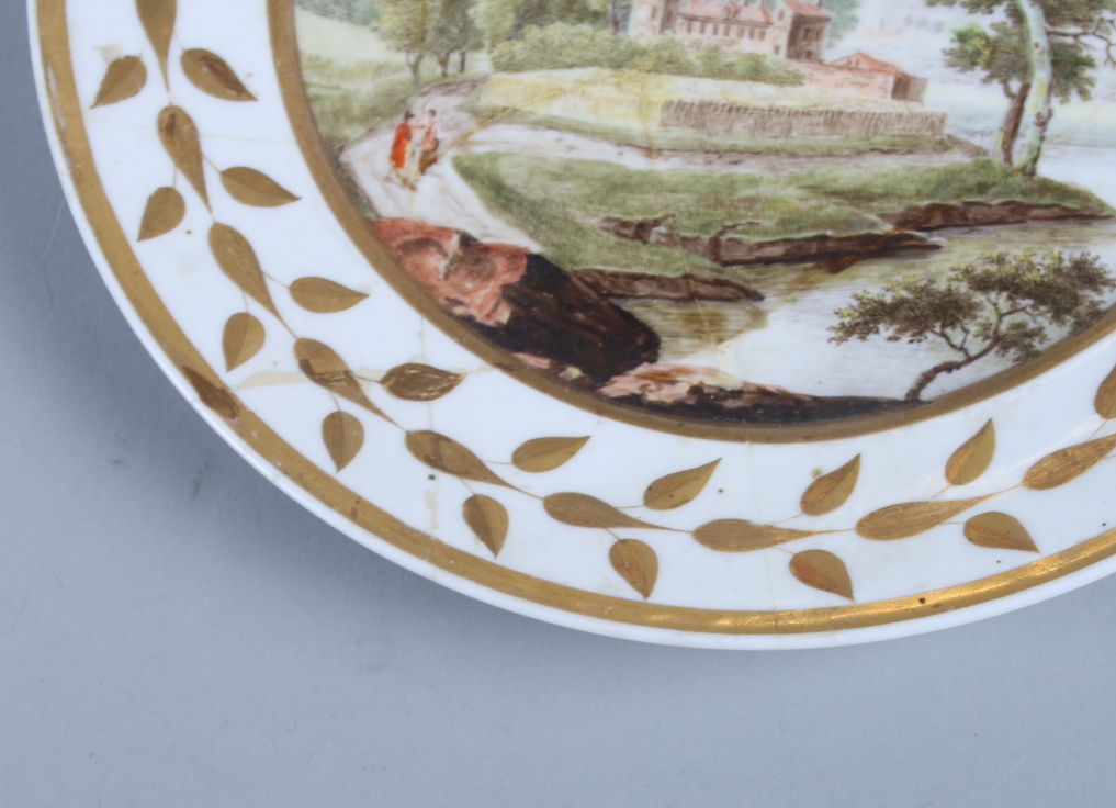 A set of five 19th century French porcelain plates, with landscapes within a gilt painted leaf - Image 9 of 15