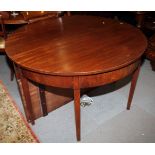 A 19th century oval mahogany dining table with centre leaf, on square tapered supports, 48" dia