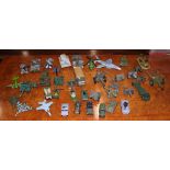 A collection of die-cast military vehicles and aircraft