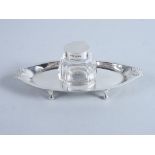 A cut glass inkwell with silver lid and stand, by James Dixon & Son, 1.9oz troy approx