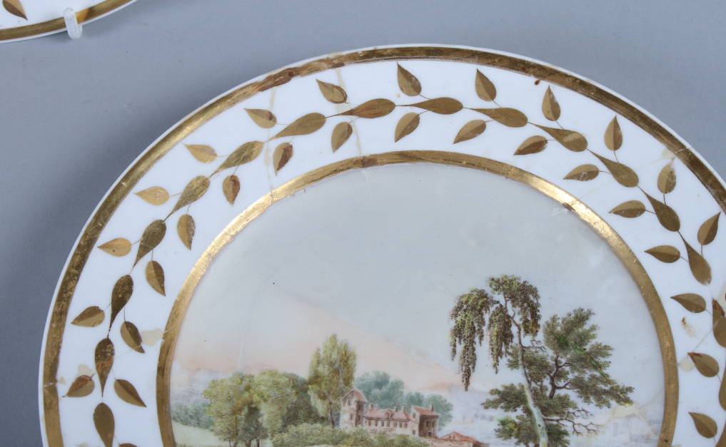A set of five 19th century French porcelain plates, with landscapes within a gilt painted leaf - Image 7 of 15