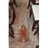 A silky pile Persian design rug, decorated nine mihrab panels, main scrolling leaf border stripe,