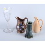 A Doulton Lambeth stoneware ewer, a Doulton Lambeth vase, a lustre jug and a glass vase