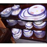 A Copeland & Garrett dinner service, decorated sprays of flowers within a blue and gilt painted