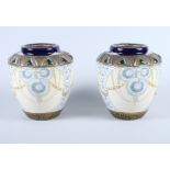 A pair of late 19th century Ernst Wahliss and Alfred Stellmacher of Turn Vienna porcelain vases,