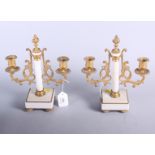 A pair of 19th century gilt metal and marble two-branch candlesticks, 8" high