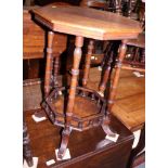 A Victorian octagonal walnut occasional table, fitted galleried undertier, 18" dia