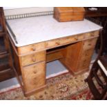 A 19th century grained as bird's eye maple twin pedestal washstand, fitted white marble top with