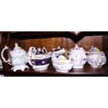 A 19th century blue and gilt boat-shape teapot, a number of other 19th century teapots and a bat
