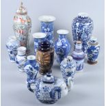 Twelve Chinese porcelain vases, various, and an elephant teapot (extensive damages)