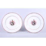 A pair of early 20th century armorial plates, Sampson of Paris?, with coat of arms for the Bourne