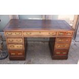 A Victorian mahogany twin pedestal desk with central three drawers and to banks of drawers, 53" wide