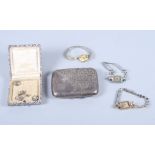 A lady's 9ct gold cased wristwatch, two other wristwatches, two pairs of earrings and a silver