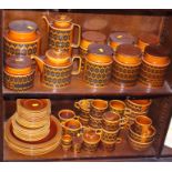 A Hornsea "Heirloom" pottery part combination service, including storage canisters, cups, a coffee