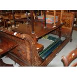 A French 19th century walnut and marquetry work bateau lit with panels of birds and flowers, 51" x