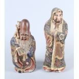 Two early 20th century Japanese Satsuma pottery figures, Shao Lao and a bearded gentleman, 9" high