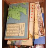 A collection of assorted boxed games, in a black painted pine box, 29" wide