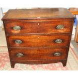 An early 19th century mahogany chest of three long drawers, on bracket feet, 38" wide